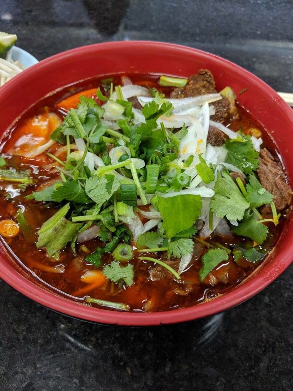 Noodle soup with fresh herbs