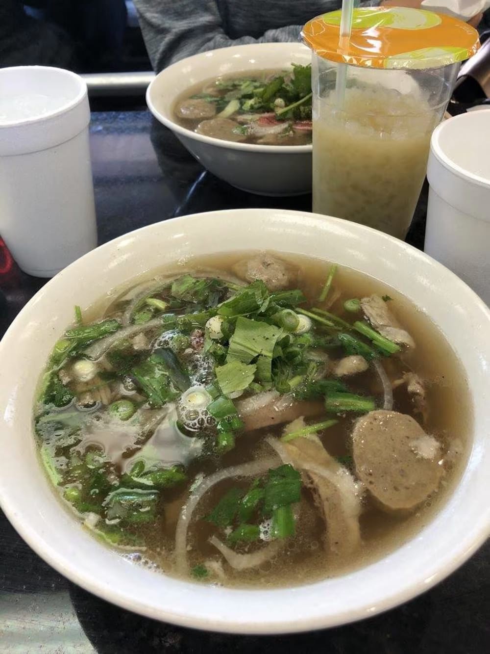 Phở bowl with fresh herbs
