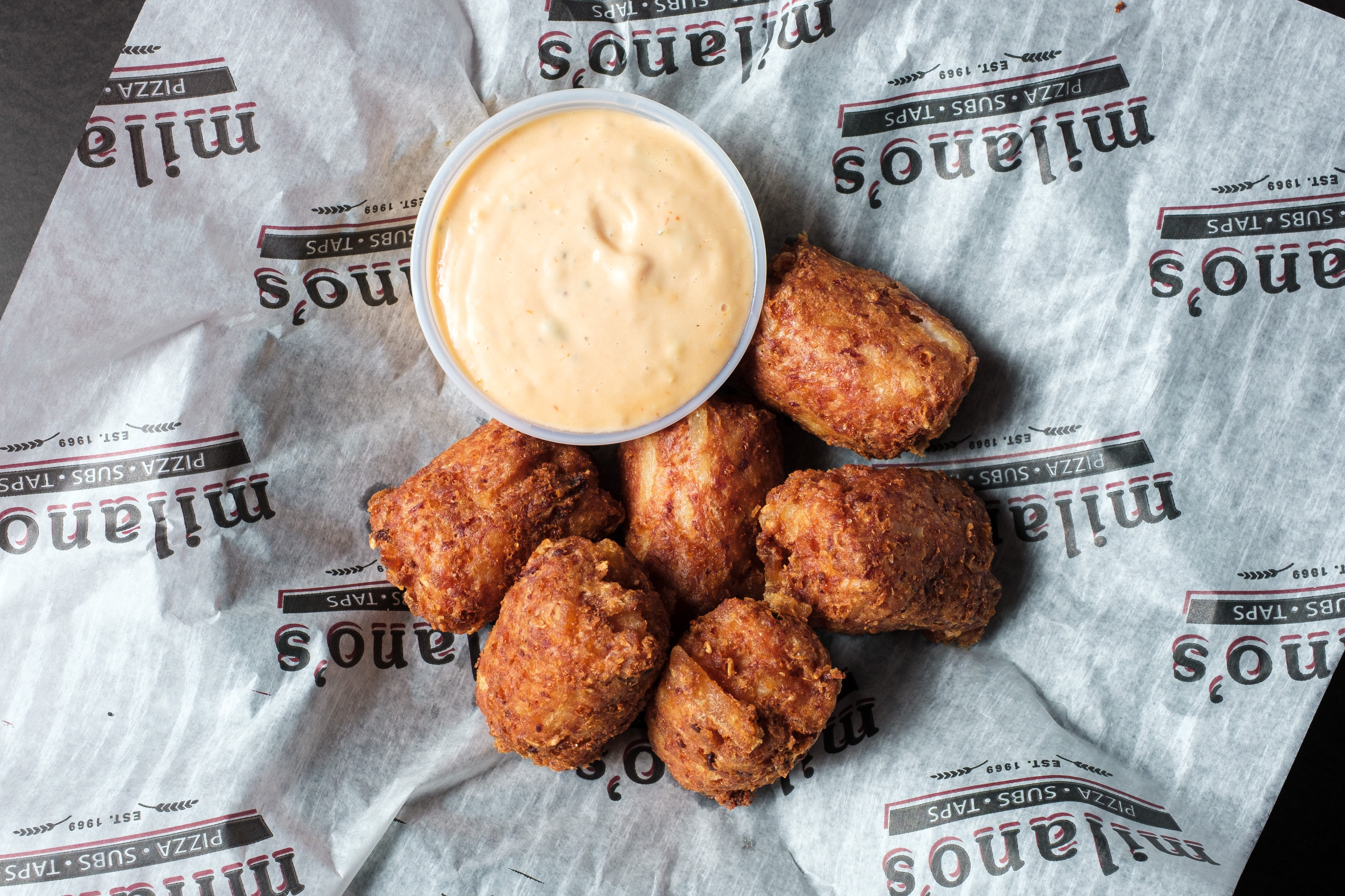 Basket of buffalo boneless wings served with ranch dipping sauce