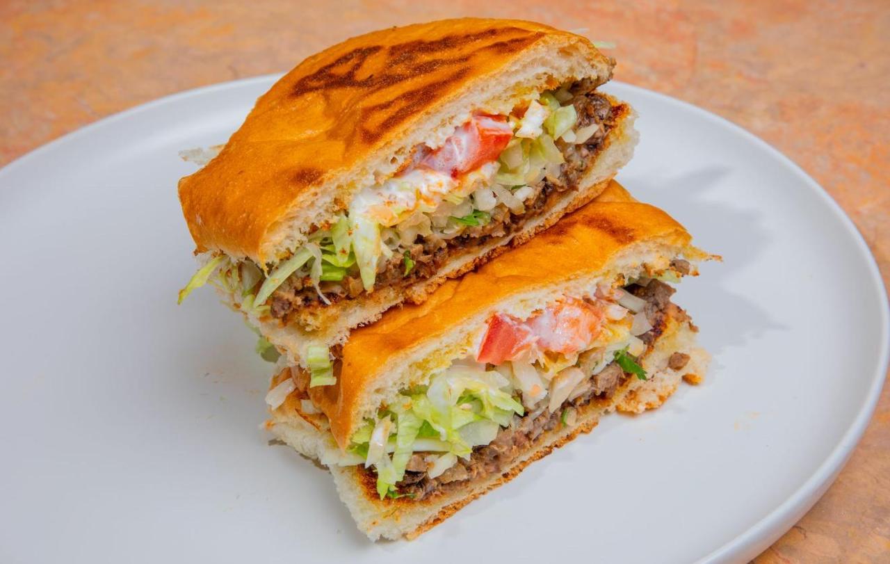 Mojarra frita — whole fried fish with orange and lime