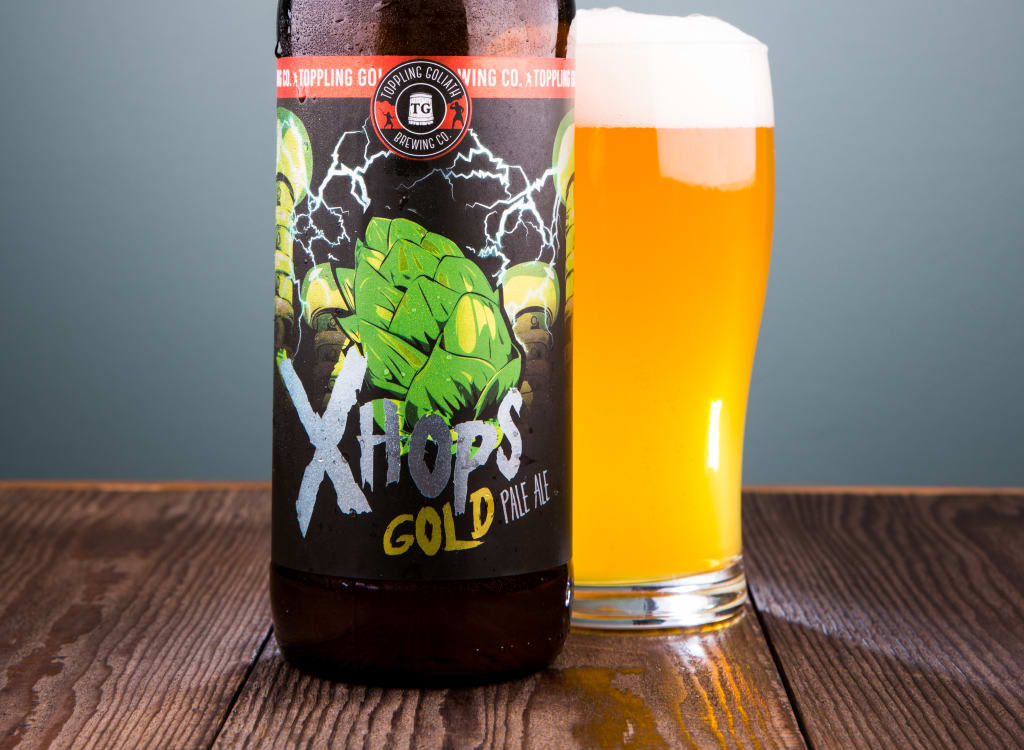 topplingGoliathBrewingCo_xHopsSeries-GoldIPA