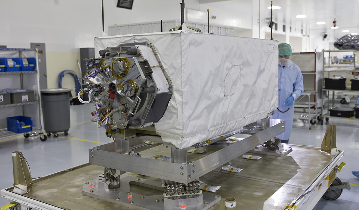 The Ecosystem Spaceborne Thermal Radiometer Experiment (ECOSTRESS), seen here undergoing inspection at Kennedy Space Center prior to launch