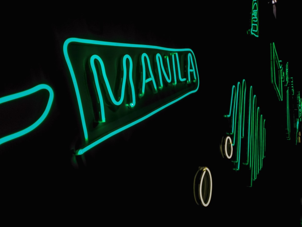 manila in a neon sign