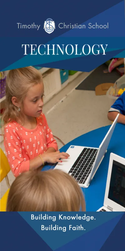 Technology Banner:  One student is developing computer skills while working on a school chromebook.