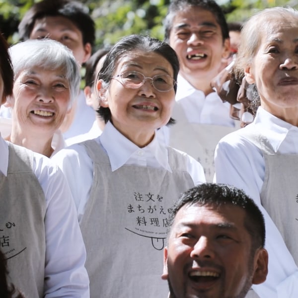 Group of elderly people laughing and smiling