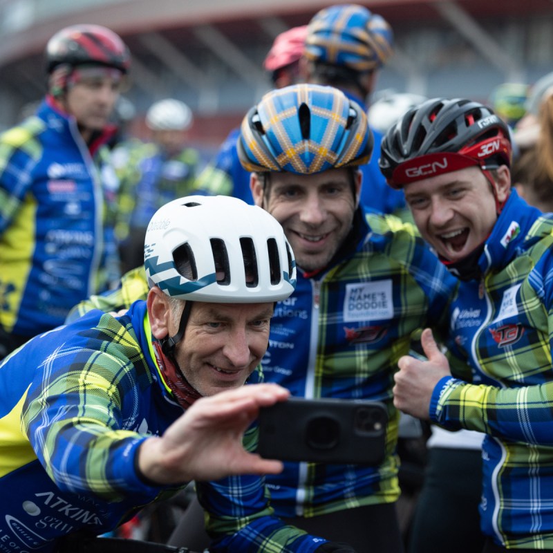 Doddie Aid cyclists pause to take a selfie