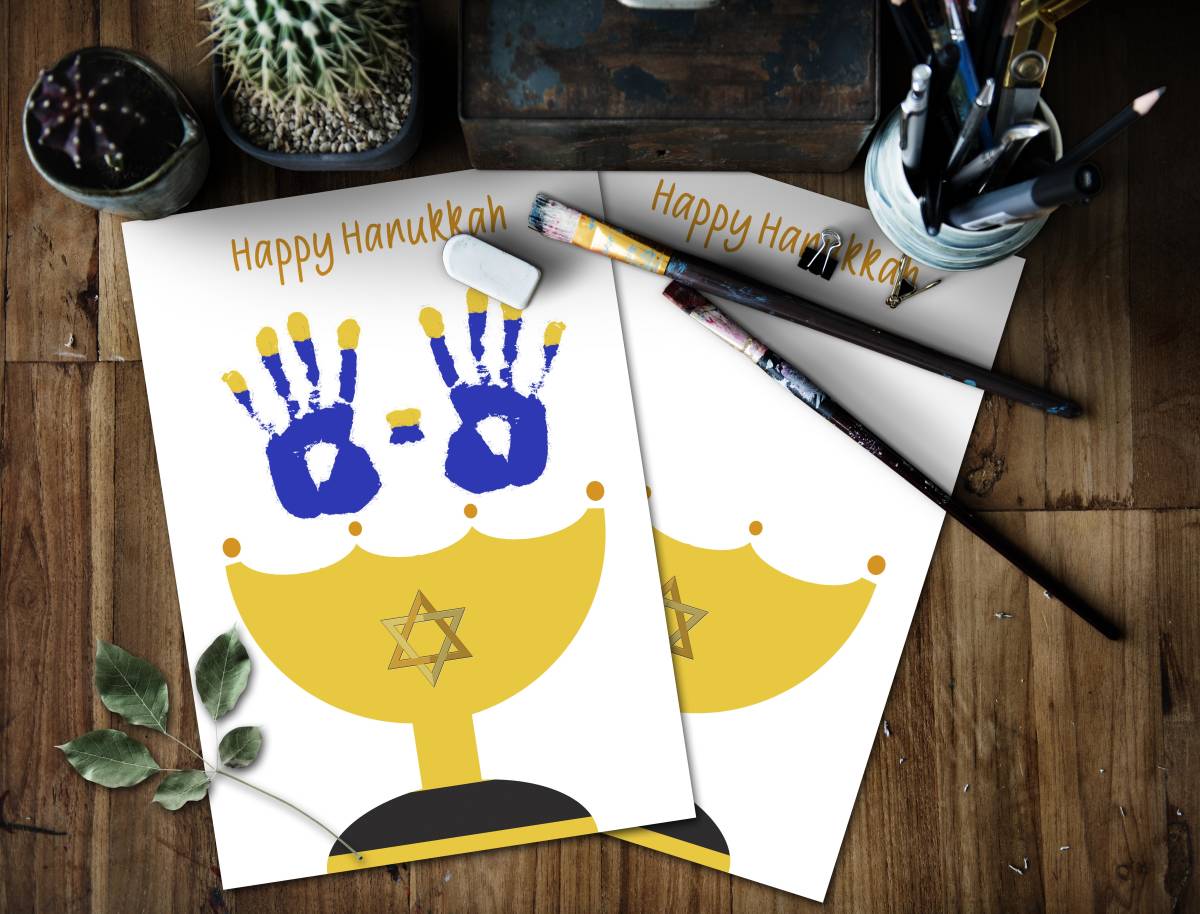 An educational teaching resource from Forever June Digital Design entitled Hanukkah Activities, Jewish Crafts, DIY Menorah Handprint Art downloadable at Teach Simple.