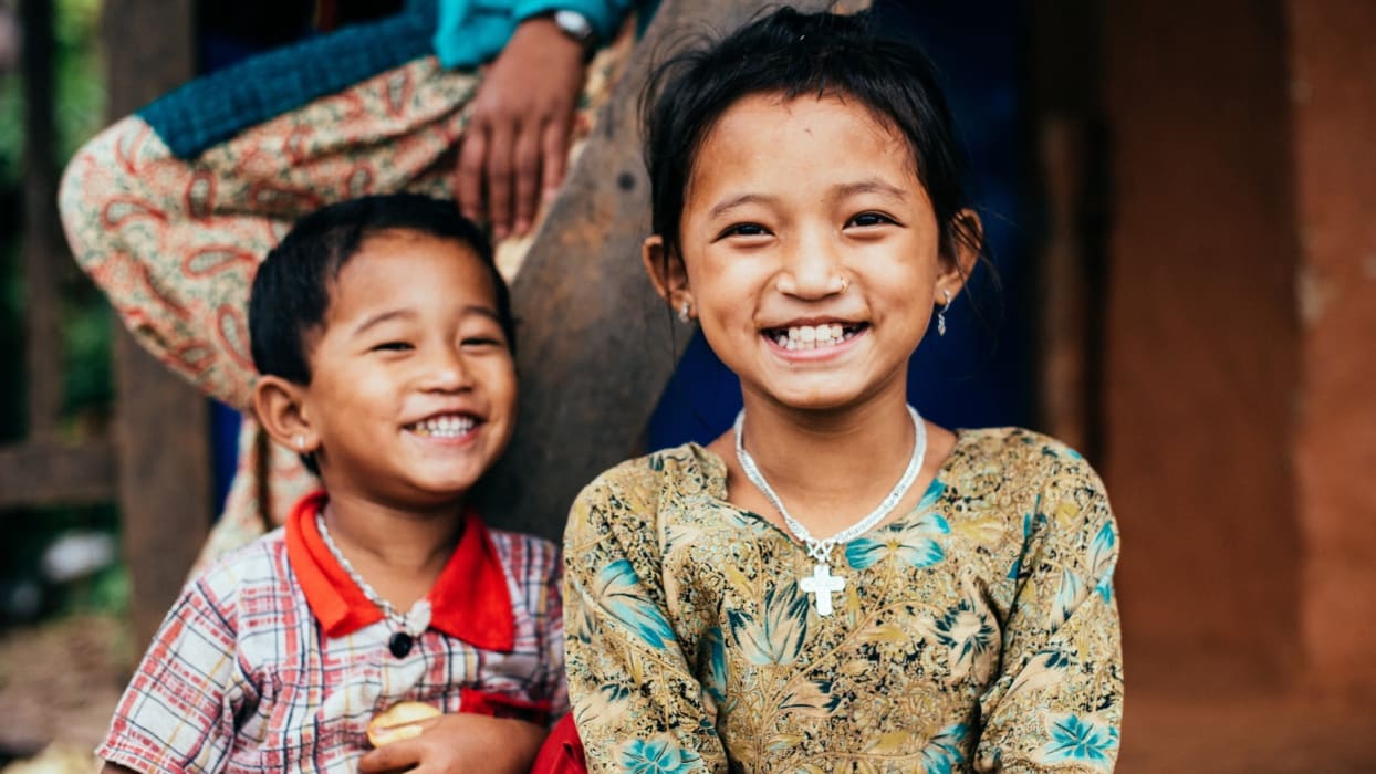 Two children smiling