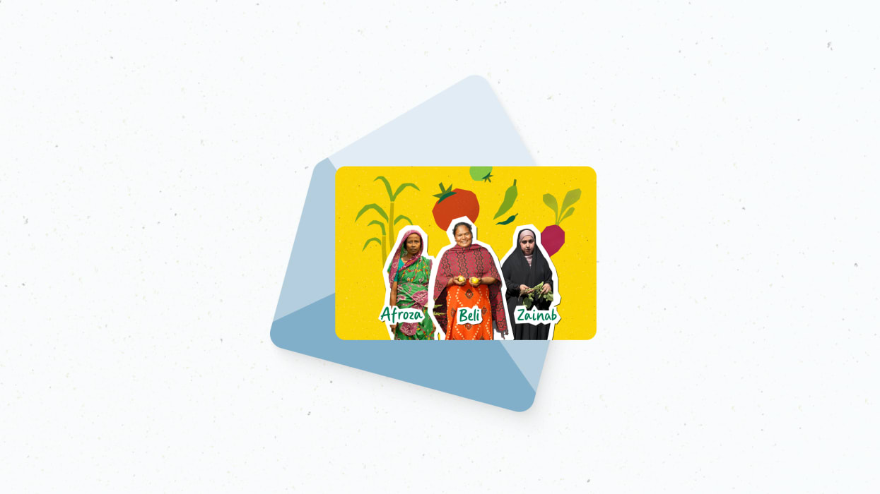 Yellow gift card with portraits of three women, Afroza, Beli, and Zainab, and illustrations of vegetables, partially emerging from a blue envelope.