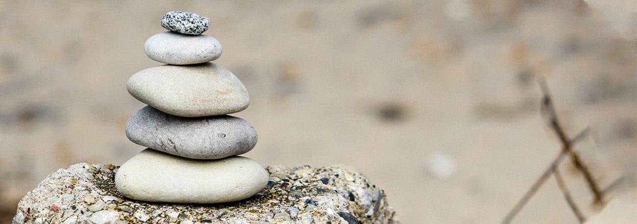 Five rocks in a stack (Unsplash)