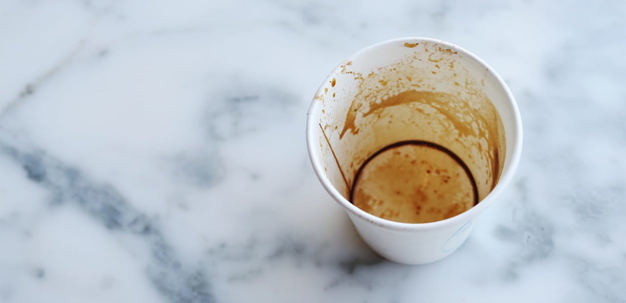 Empty paper cup with coffee stains (Pexels)