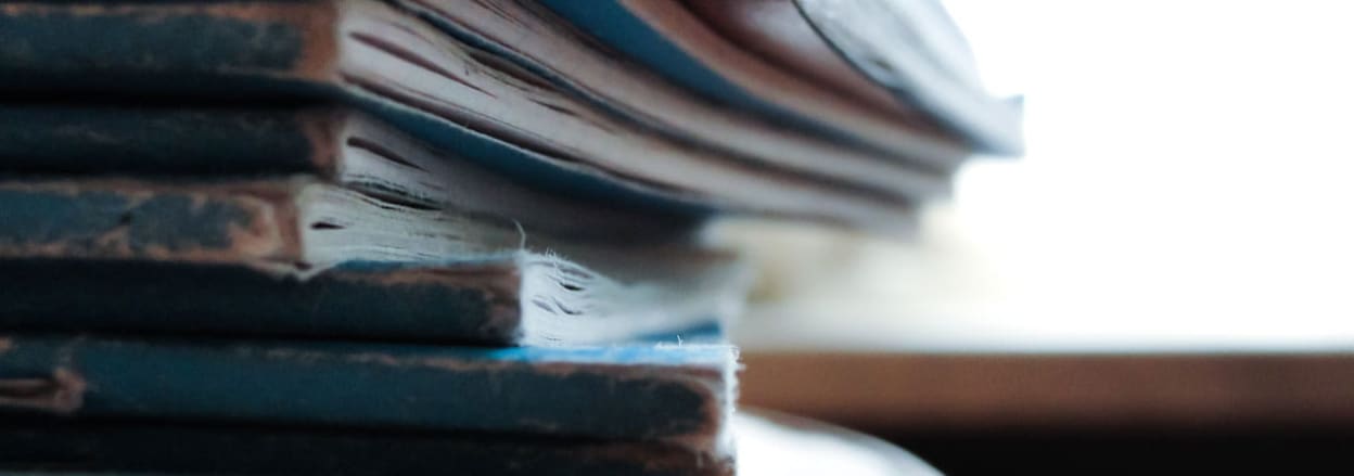 Pile of exercise books