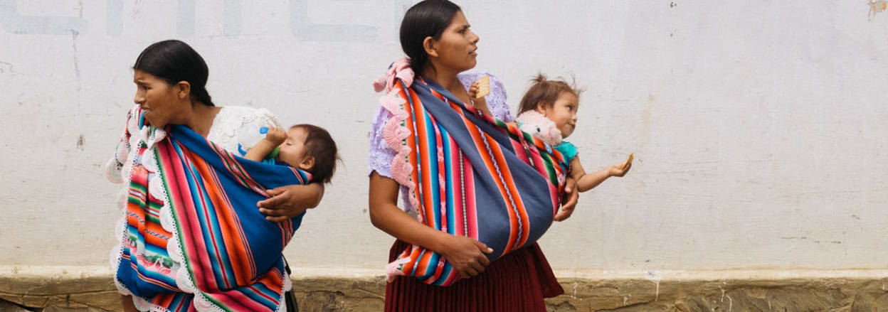 Two Bolivian women with children