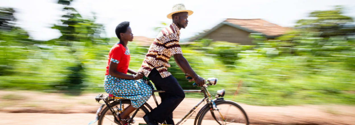 Jilbert cycling on his taxi