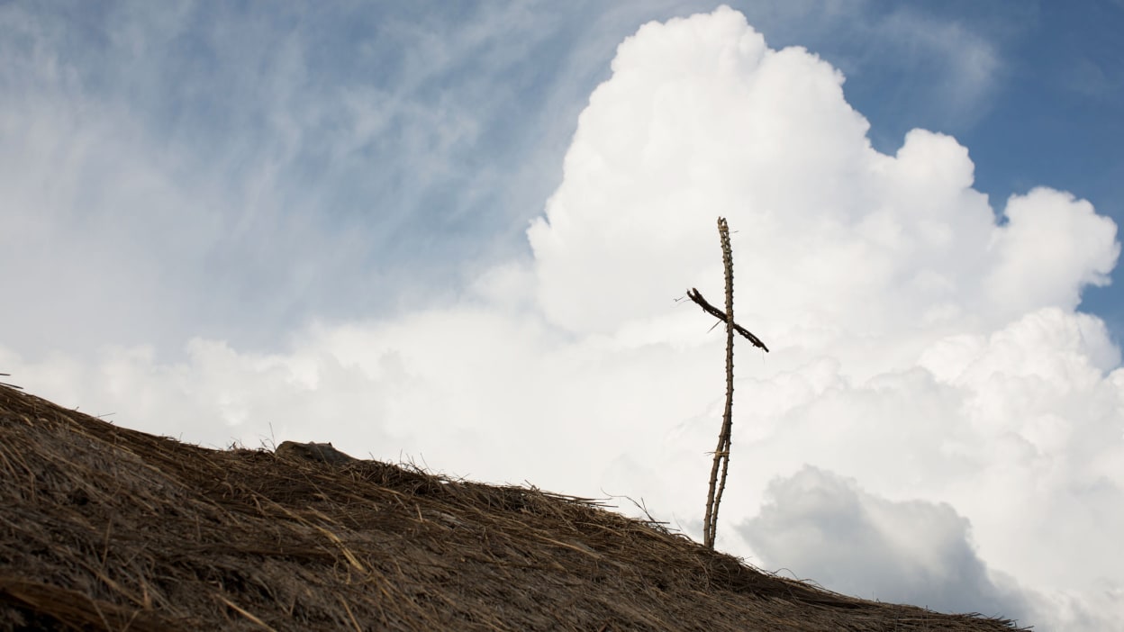 A cross on the roof of a church in a village in Uganda.