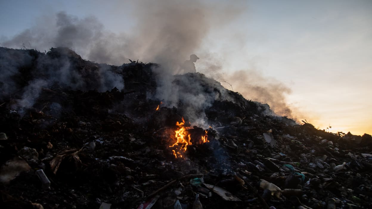 Many people living in poverty are forced to dump and burn rubbish, making the climate emergency worse.