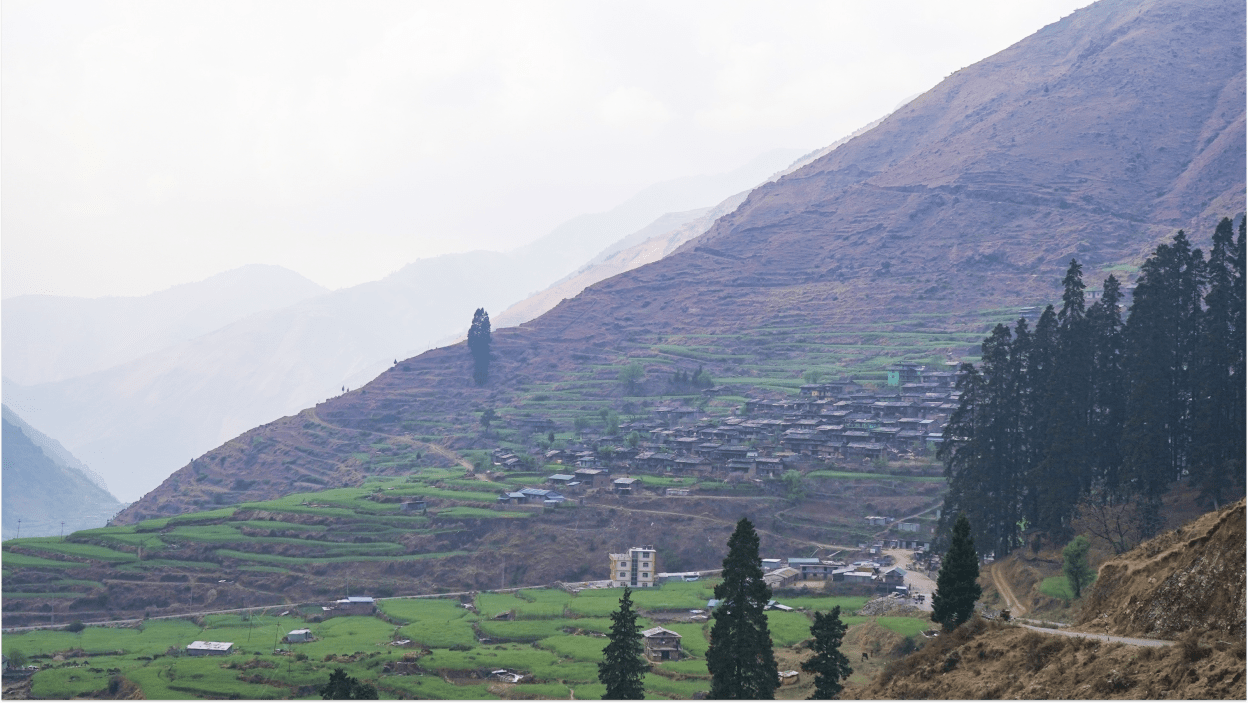 Hills and villages in rural Nepal. As people move from rural to urban areas in search of ways to provide for themselves and their families, this can increase their vulnerability to becoming victims of human trafficking.