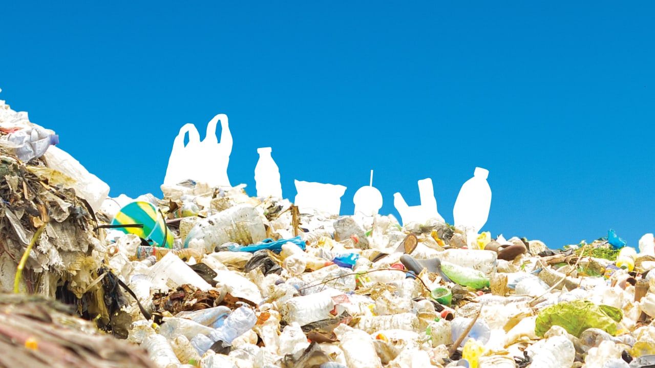 A photo of a large pile of plastic rubbish in the foreground. Behind is a blue sky and white silhouette  graphics of various plastic items like plastic bags and bottles.