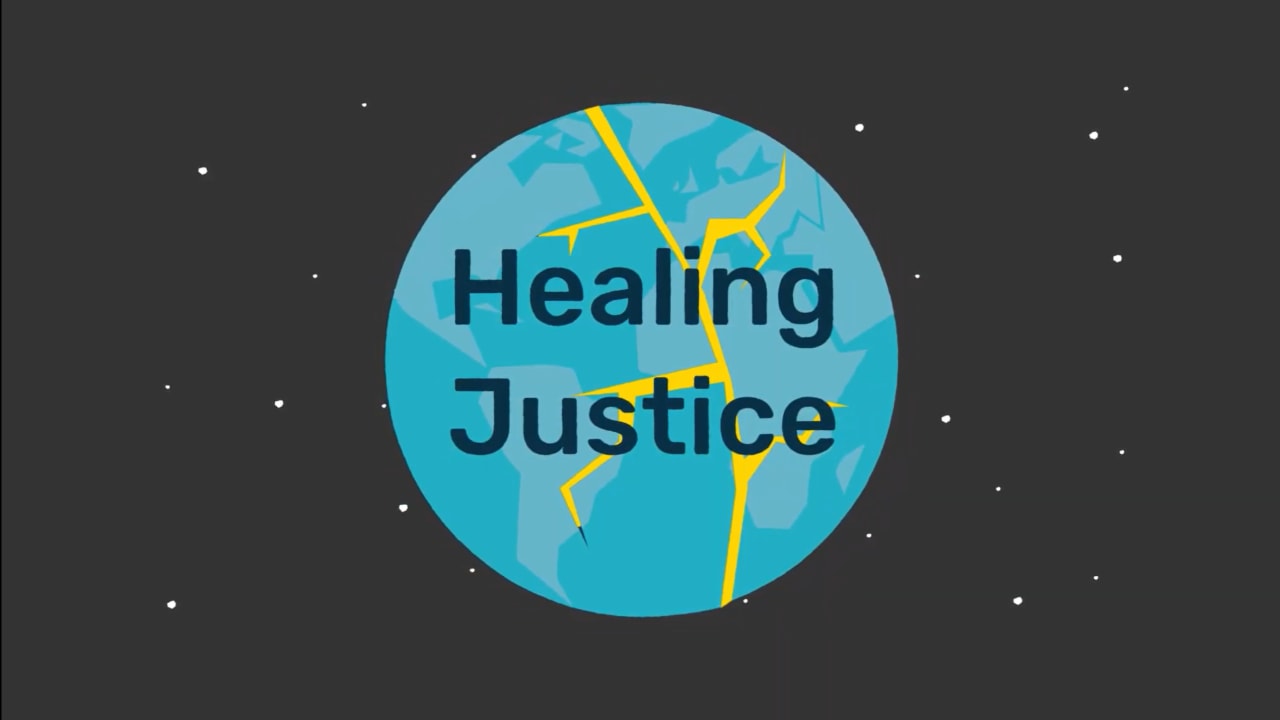 An animated globe with cracks running through it being filled with gold. The text ‘Healing Justice’ appears over the globe