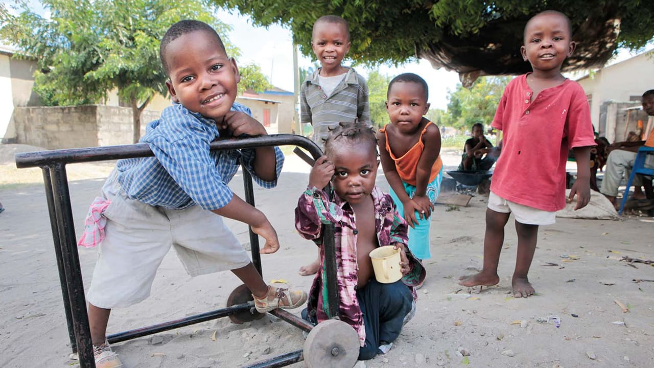 Simple walking aids such as this one in Tanzania can help children with mobility problems gain independence. 