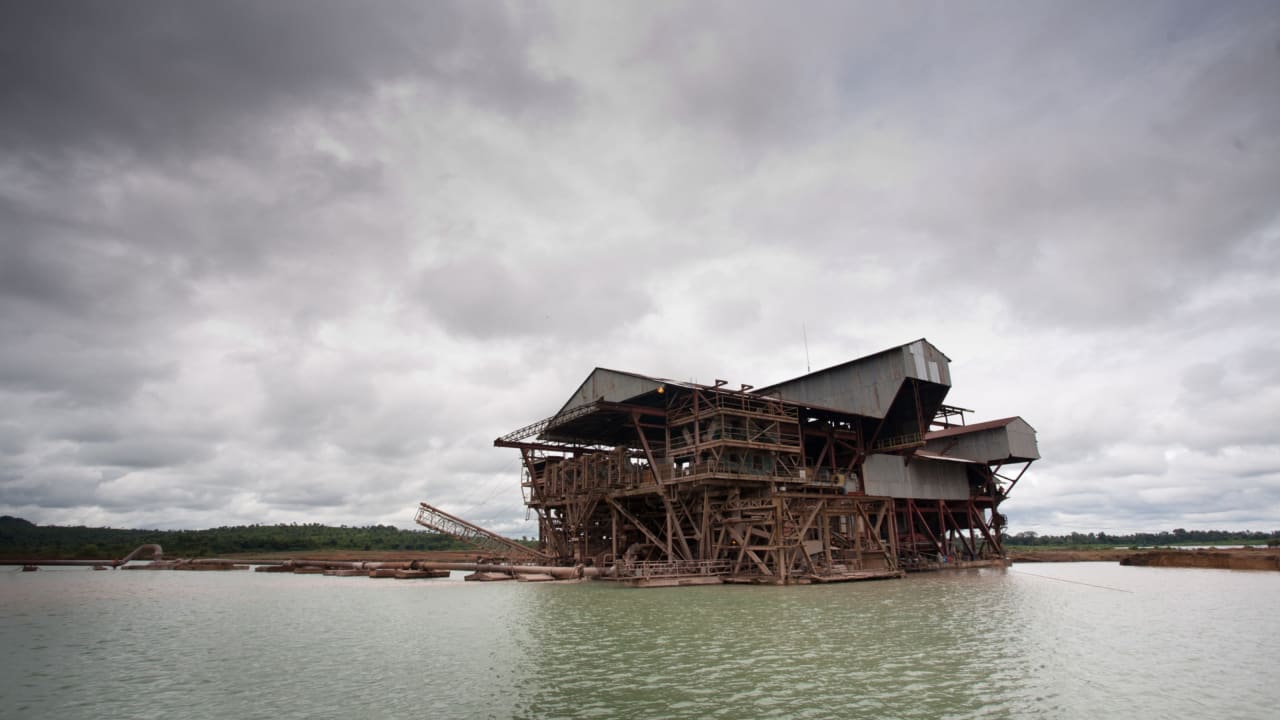 This floating structure, the size of a small office block, is dredging for rutile, the raw material from which titanium is produced. Photo: Jay Butcher/Tearfund