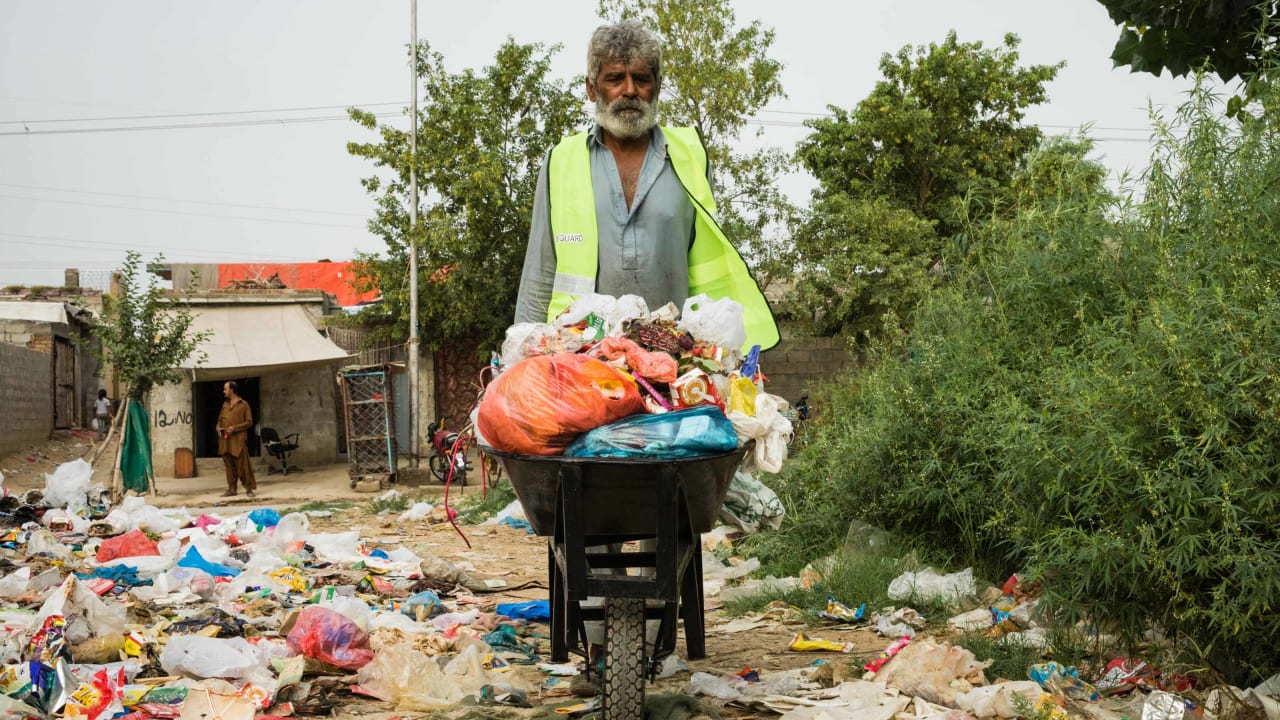 Waste collectors in Pakistan serving their community through a waste management project with Tearfund partner Pak Mission Society (PMS).