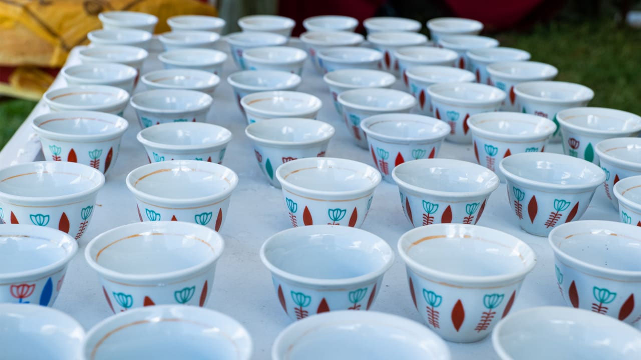 A table full of empty coffee cups