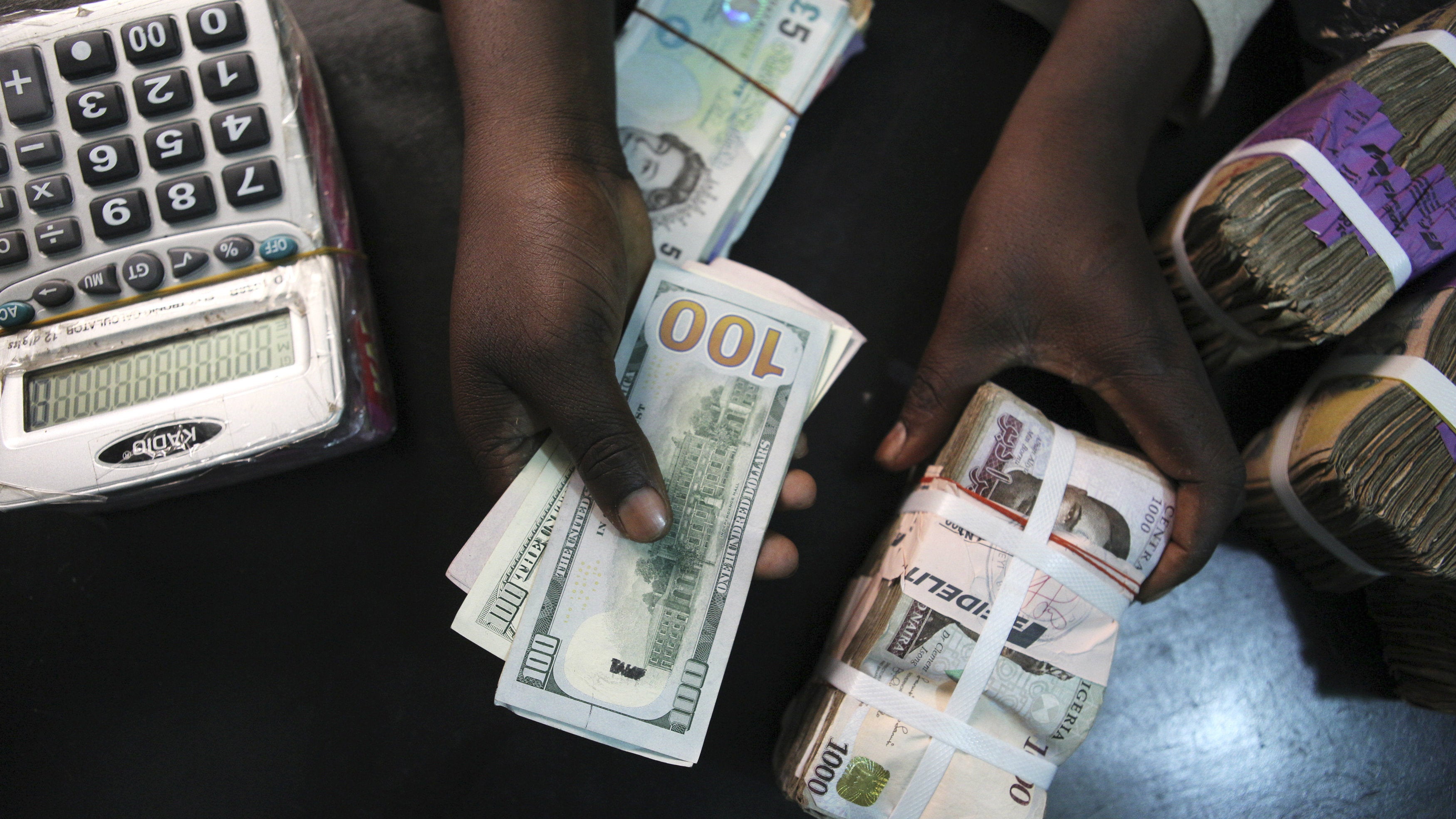 Naira Holds at ₦1,421/$ Officially, ₦1,450 on Parallel Market as FX Pressures Persist