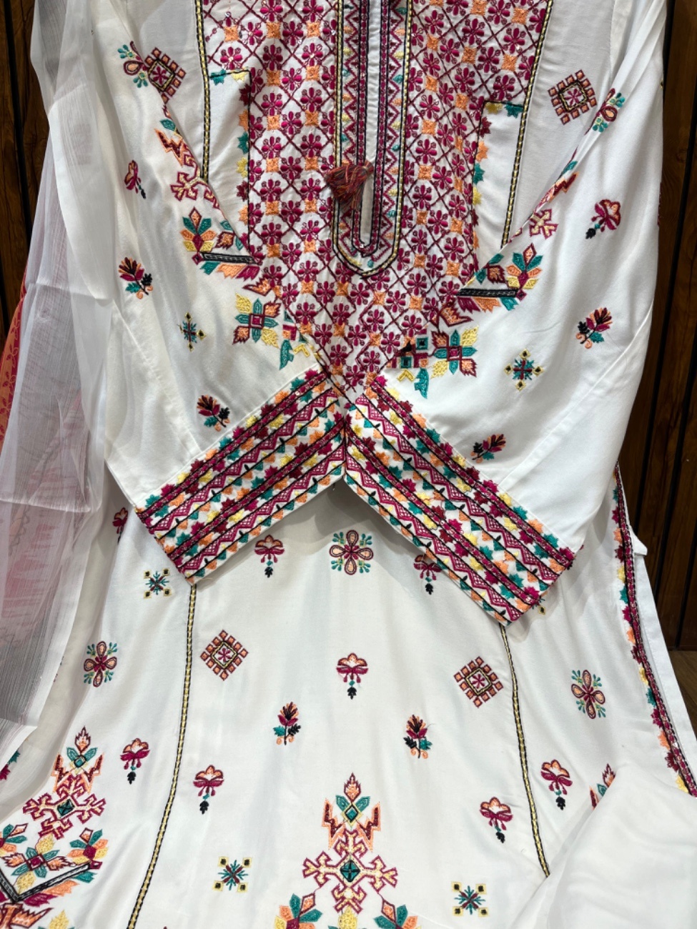 Elegant white cotton suit featuring vibrant multicolor heavy embroidery work on the neckline-1