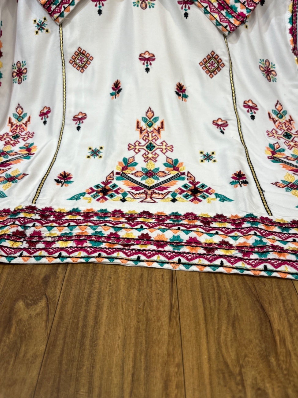 Elegant white cotton suit featuring vibrant multicolor heavy embroidery work on the neckline-2
