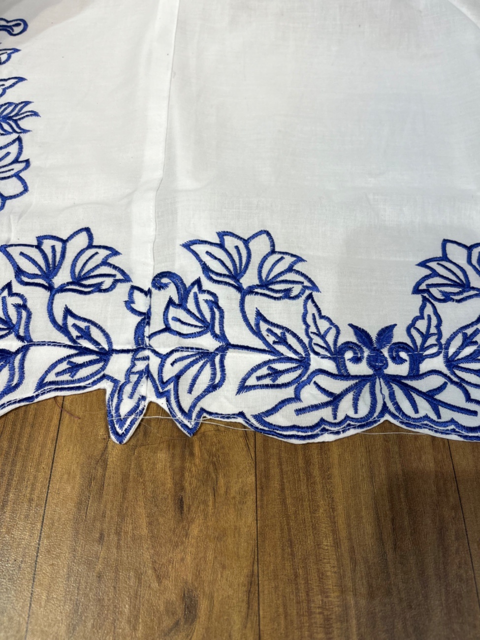 This elegant white cotton suit features beautiful royal blue thread embroidery-1