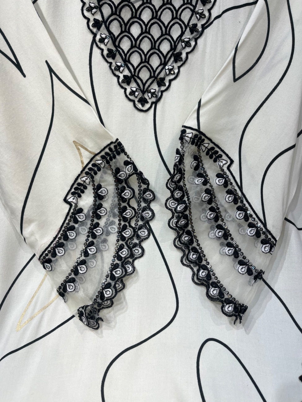 White and Black rayon suit with neck cutwork and daman cutwork with comfortable pant with pattern-1