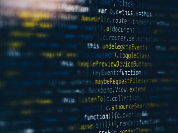 Stylistic photo of a computer screen with source code.