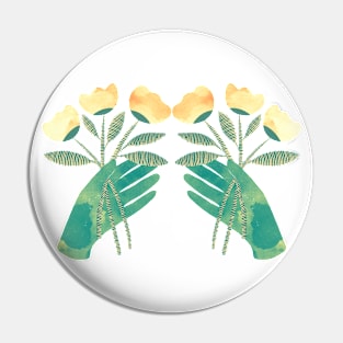 Green hands with yellow flowers Pin