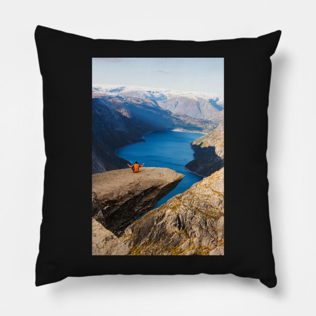 Man sitting on Trolltunga rock meditating Pillow by mooonthemoon