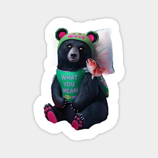 black bear wearing a green bib with the text “WHAT YOU MEAN JUICE FREE?” and a green hat with red dots. The bear is holding a fish in its left paw and sitting with its right paw resting on its leg, displaying pink pads on the soles of its feet Magnet