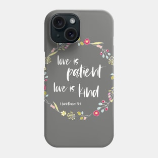 Christian Bible Verse: Love is patient, love is kind (flower wreath with white text) Phone Case