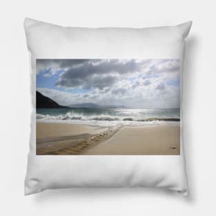 Beautiful view on the ocean and rocks from sandy beach in Ireland Pillow