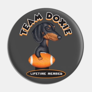 Black Dachshund Holding Orange Football Pin