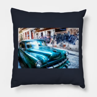 Old green American car on the streets of Havana Cuba Pillow