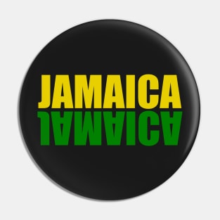 Jamaica mirrored in the colors of the Jamaican flag black green and gold Pin