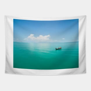 Aerial view of fishing boat on emerald sea Tapestry