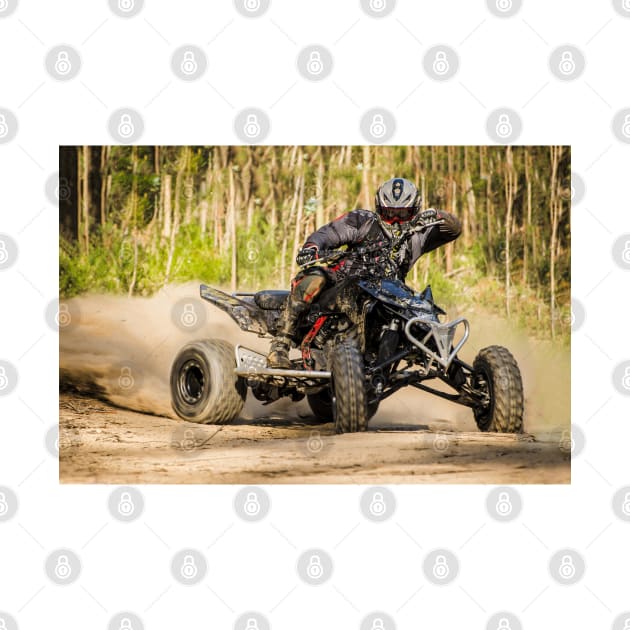 ATV racer takes a turn during a race. by homydesign