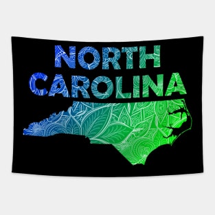 Colorful mandala art map of North Carolina with text in blue and green Tapestry