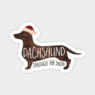 Dachshund Through The Snow - a funny Christmas design of a weiner dog with a Santa hat Magnet