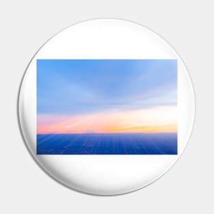 Abstract sunset across urban and desert landscape Pin