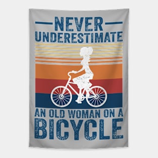Never Underestimate An Old Woman On A Bicycle Tapestry