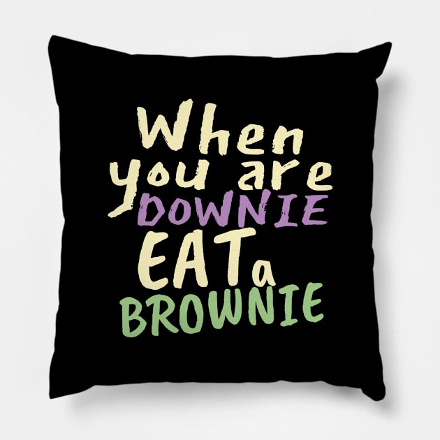 When you are downie, eat a brownie Pillow by Sourdigitals