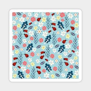 Spring meadow in bloom with ladybirds on blue background Magnet