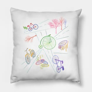 Bikes, streets, tires, trees in a simple design of pastel colors.  Car, share the road. Pillow